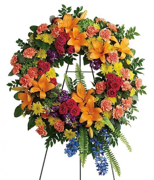 Solace In Blooms Sympathy Wreath with Hydrangea, Lilies, Roses, and Delphinium