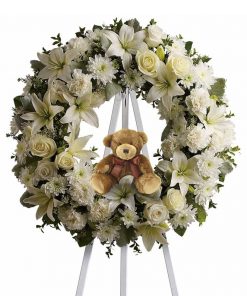 Baby boy funeral flowers teddy bear standing spray with white lilies and pearl roses