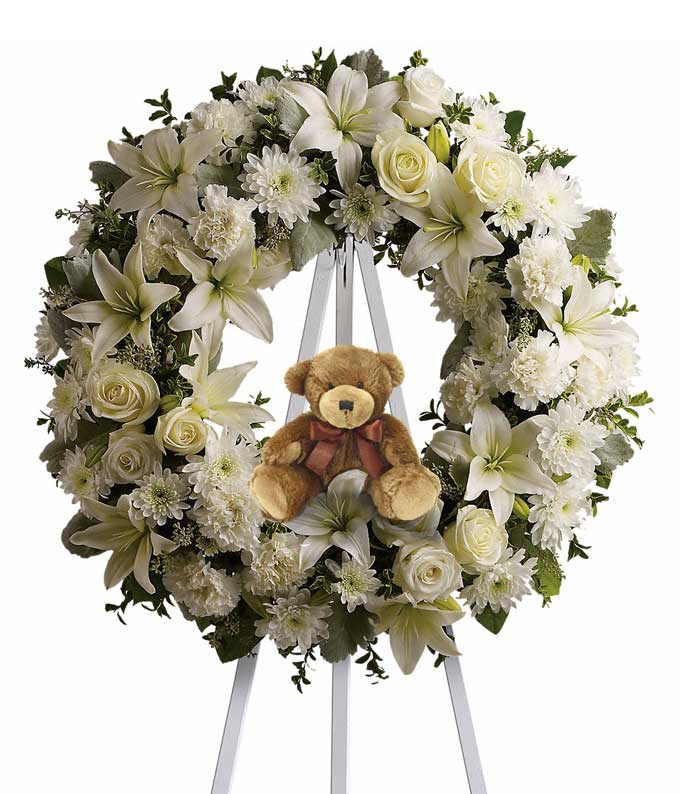 Baby boy funeral flowers teddy bear standing spray with white lilies and pearl roses