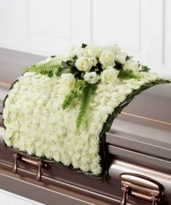 Blanket of Blooms white casket flower blanket with white chrysanthemums, roses, lisianthus, Bells of Ireland and greenery