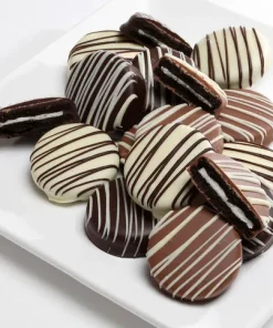 One dozen chocolate covered OREO Cookies gift dipped in milk, white, and dark chocolate with decorative chocolate drizzle