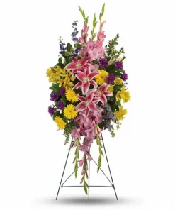 Colorful funeral standing spray with stargazer lilies daisies gladioli carnations and larkspur