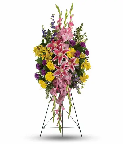 Colorful funeral standing spray with stargazer lilies daisies gladioli carnations and larkspur