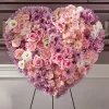 Heaven's Light Heart Spray with pink roses carnations alstroemeria white lisianthus lavender daisy poms and pink spray roses