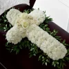 In Memoriam Casket Spray white cross funeral flowers with carnations and roses