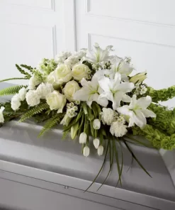 Loving Light Casket Spray with white tulips roses lilies carnations and snapdragons