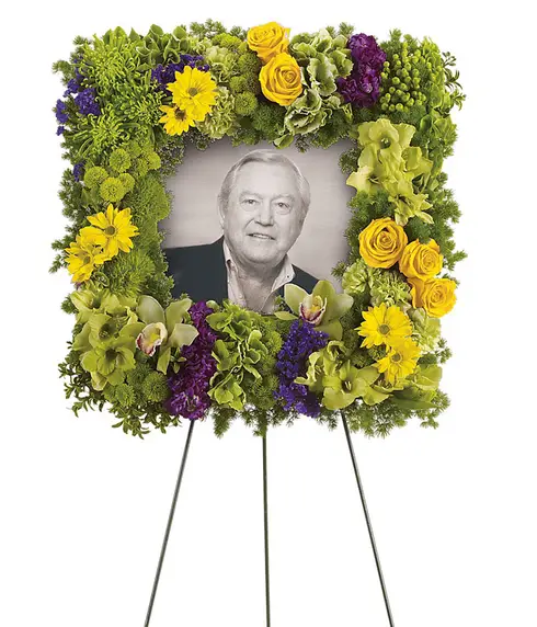Square photo funeral wreath spray with green cymbidium orchids hydrangea Fuji mums carnations yellow roses daisies and easel stand