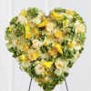 Golden heart funeral standing spray with yellow roses mini calla lilies freesia green hydrangea cream roses white chrysanthemums hypericum berries and easel stand